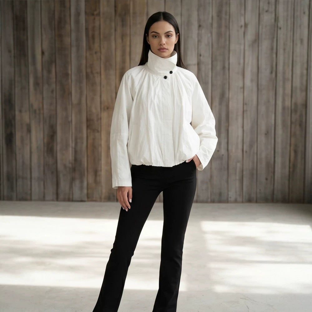 Women's short jacket with high stand-up collar, gathered shoulder area, and elastic hem Amarae