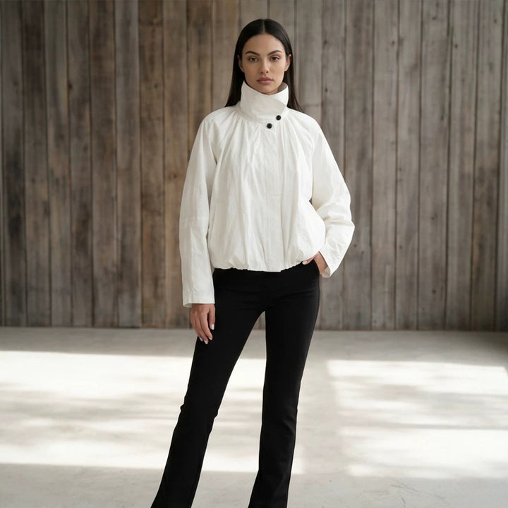 Women's short jacket with high stand-up collar, gathered shoulder area, and elastic hem Amarae