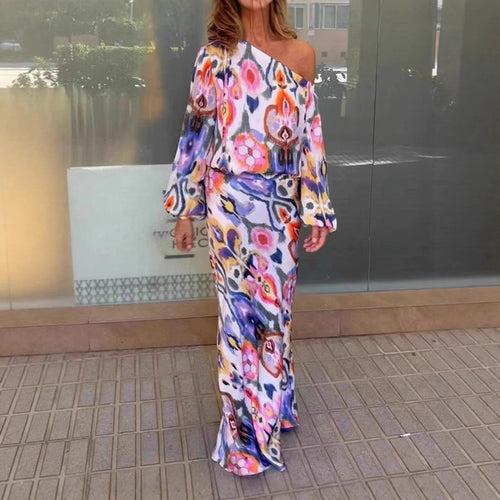 Robe maxi élégante pour femmes à coupe asymétrique avec manches lisses Chic & Stil
