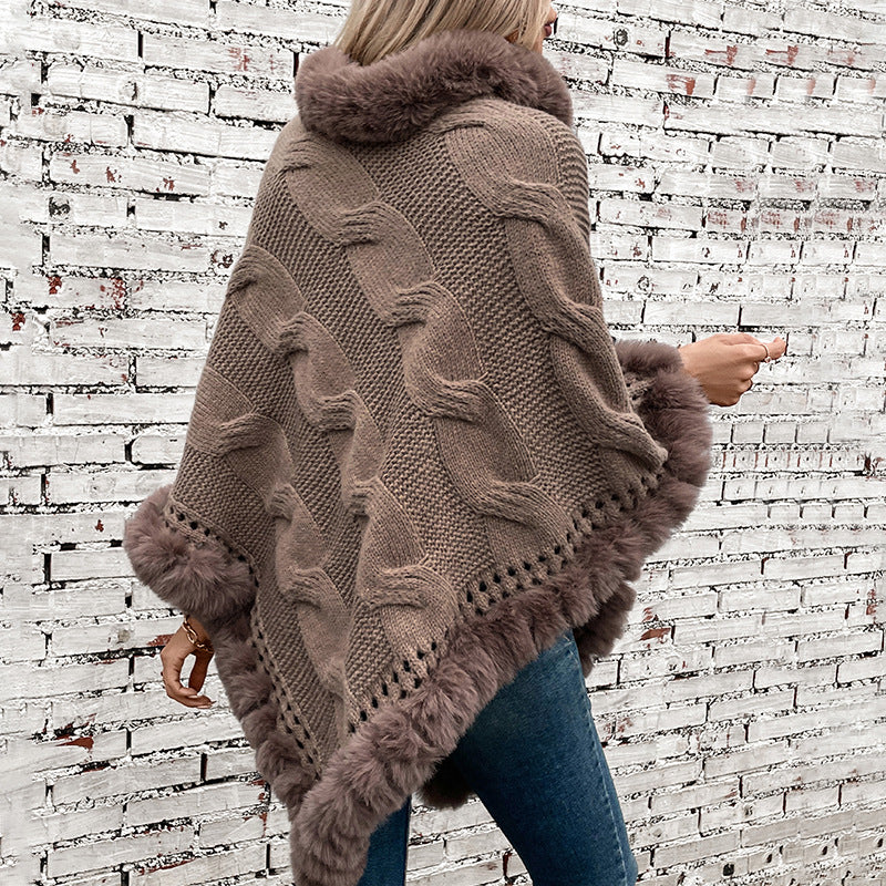 Ladies cozy poncho sweater with soft faux fur trim and cable knit pattern Lune London