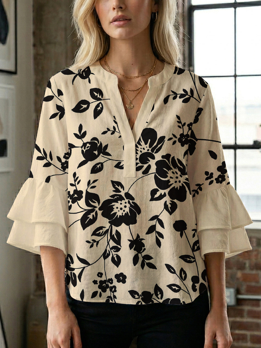 Women's casual blouse with ruffled sleeves and botanical print Lune London