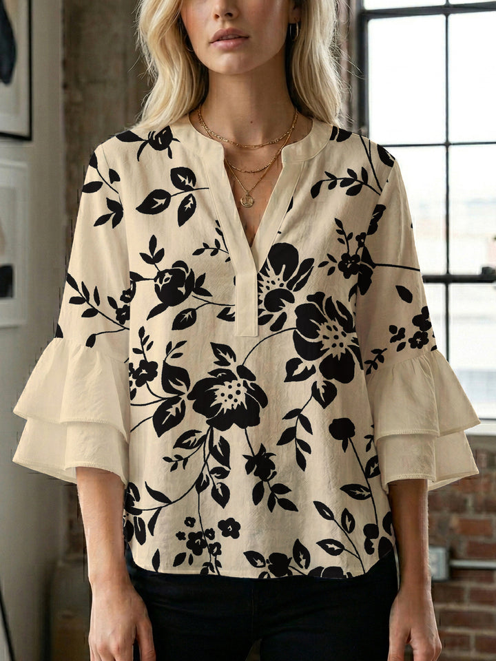 Women's casual blouse with ruffled sleeves and botanical print Lune London