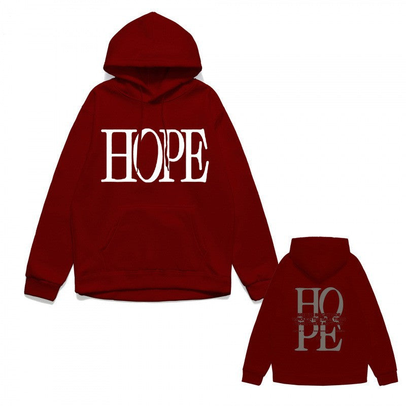 Women's hoodie with eye-catching lettering and conveniently designed kangaroo pocket Chic & Stil