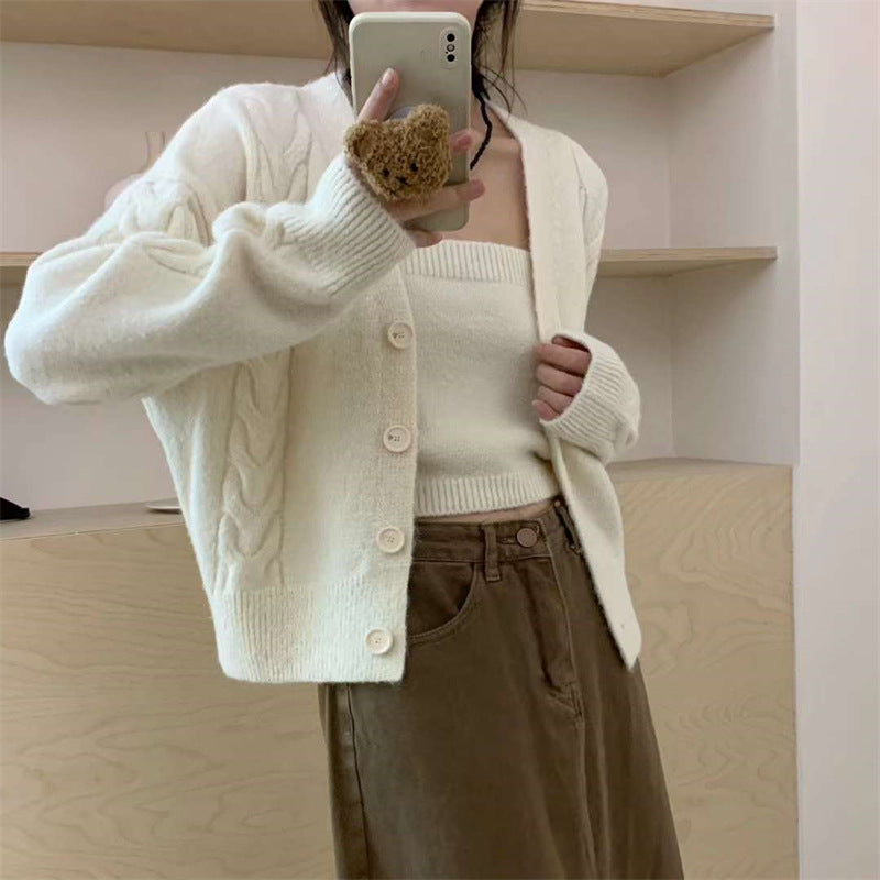 Cardigan pour femmes en maille torsadée avec patte de boutonnage et coupe élégante Chic & Stil