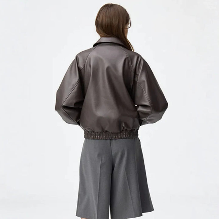 Women Boxy Cropped Faux Leather Jacket with Concealed Zipper and Elastic Hem Amarae