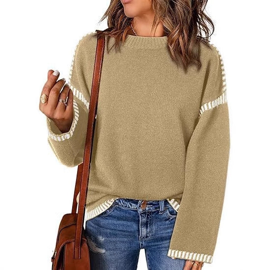 Fashionable women's sweater with structured material and stripe-shaped details Lune London