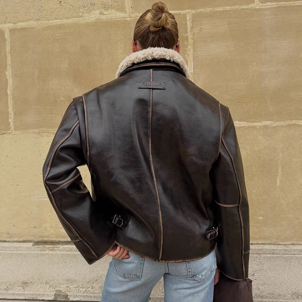Women Short Cut Leather Imitation Bomber Jacket with Voluminous Teddy Shawl Collar and Distinctive Decorative Seams Amarae