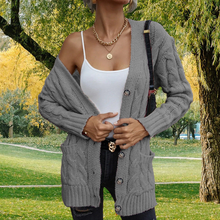 Ladies chunky knit cardigan with deep pockets and open cut Lune London