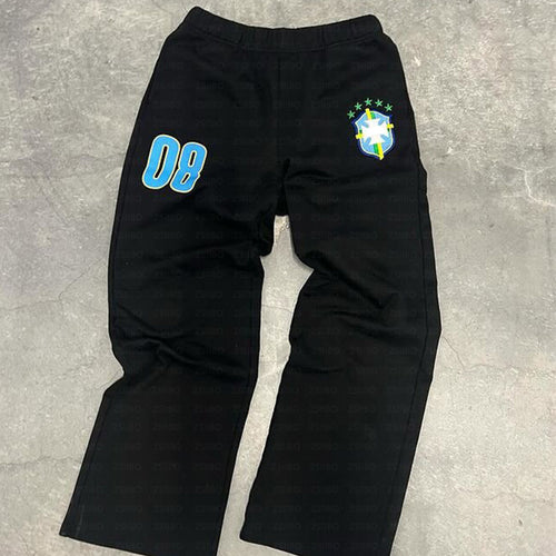Women’s sporty jogging pants with practical side pockets and elastic waistband Chic & Stil