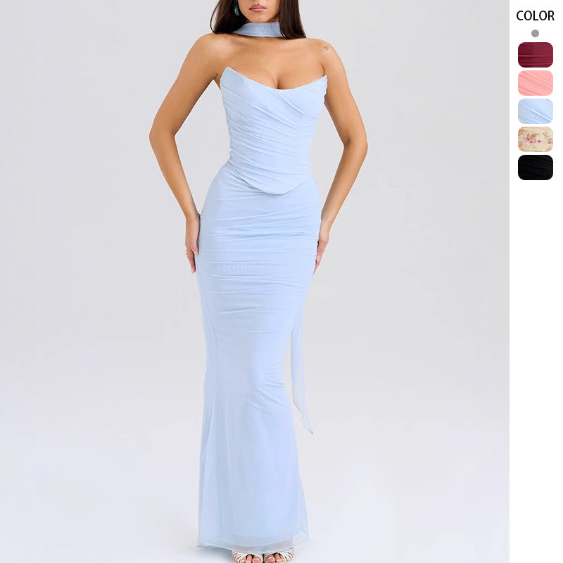 Women's form-fitting evening dress with off-shoulder design and sophisticated draping Lune London