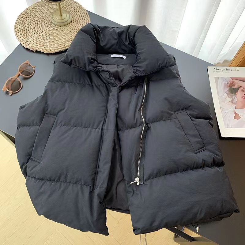 Ladies quilted vests with high collar and practical side pockets Lune London