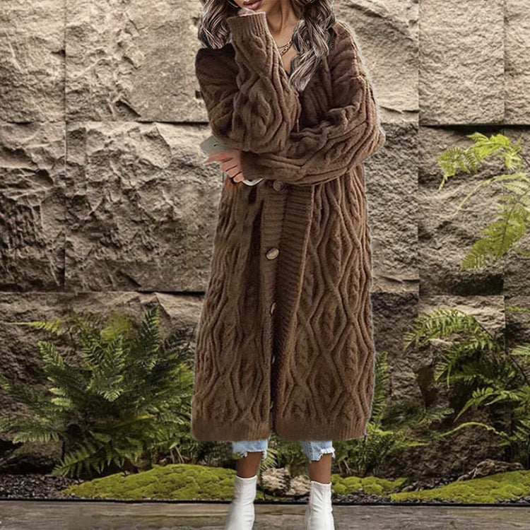Thick knit coat for women with an elegant cable structure and practical buttons Amarae