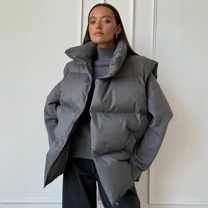 Ladies padded vest with high collar and practical side pockets Lune London