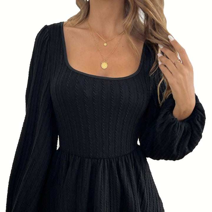 Haut à manches longues pour femmes avec de larges manches bouffantes et un attrayant col rond Chic & Stil