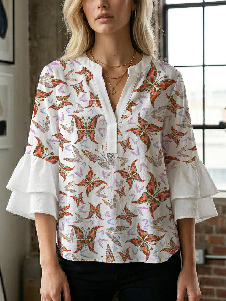 Women's blouse with voluminous ruffle sleeves and creative floral design Lune London