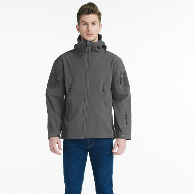 Tactical softshell jacket for men with numerous zipped pockets and an adjustable hood collar Lune London