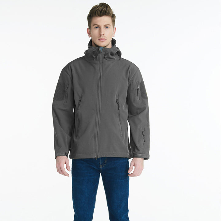 Tactical softshell jacket for men with numerous zipped pockets and an adjustable hood collar Lune London