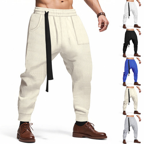 Men's casual fabric trousers with functional pockets and practical drawstring Chic and style