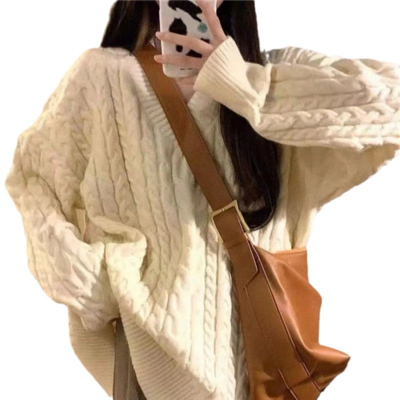 Pull en tricot épais pour femmes avec col en V et manches volumineuses Chic & Stil
