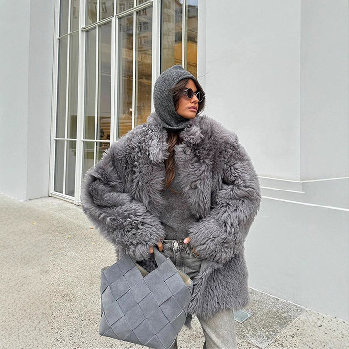 Women's Short Oversize Faux Fur Coat with Voluminous Curly Texture and Button Closure Amarae