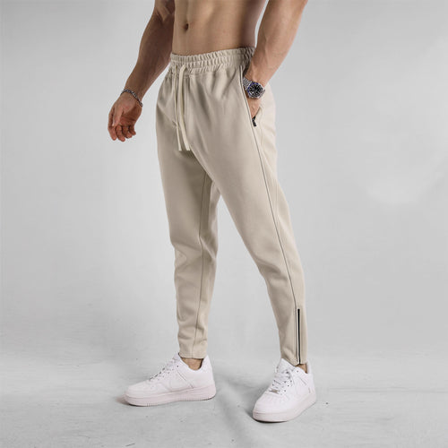 Sporty jogging pants for men with elastic waistband and side zip pockets Amarae