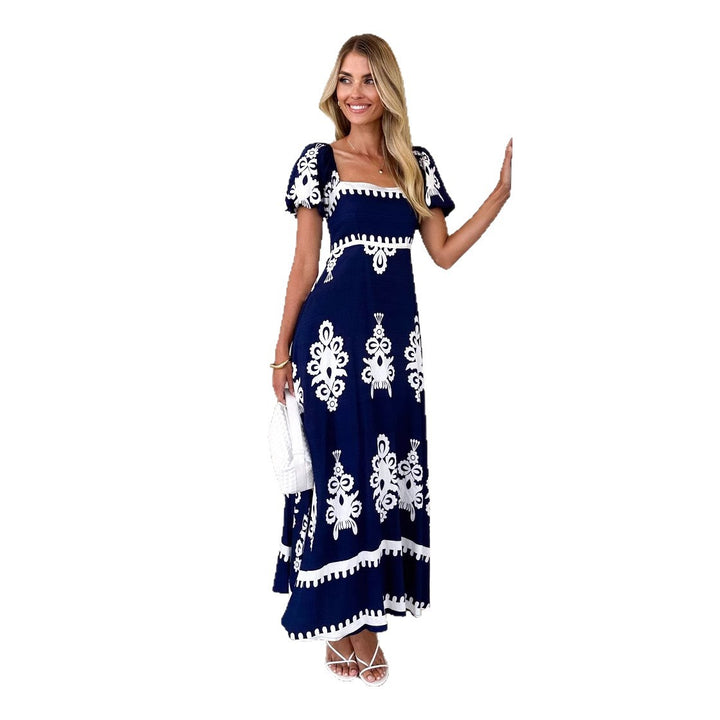 Women's maxi dress with elegant ruffle details and floral pattern Lune London