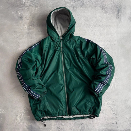 Veste de coupe-vent pour femmes avec capuche doublée et poches latérales Chic & Stil