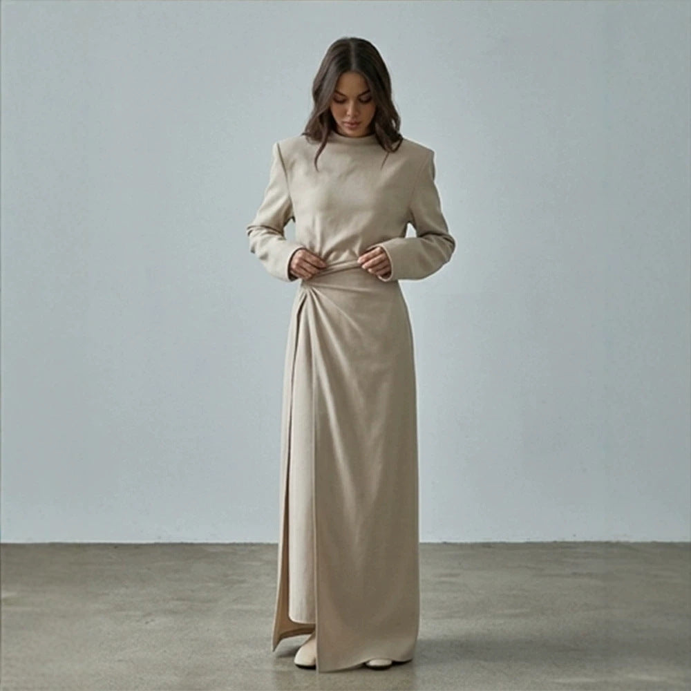 Women’s maxi dress with tailored silhouette, flared skirt and striking shoulders Amarae