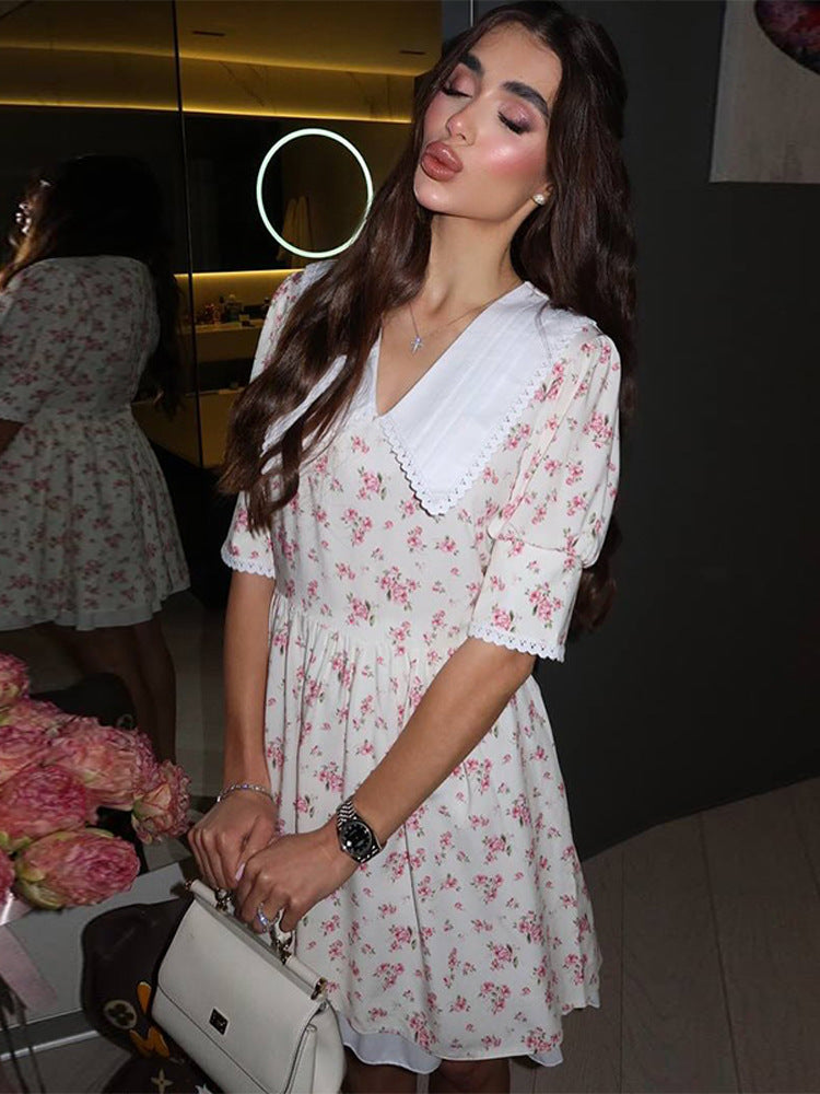 Ladies Romantic Mini Dress with Oversized V-Neck, Ruching and Floral Print Amarae
