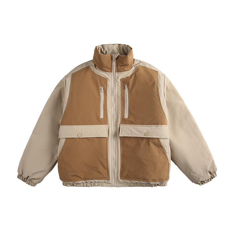 Unisex Boxy padded stand-up collar jacket with contrast panels, vertical chest zippers, and large flap pockets Amarae