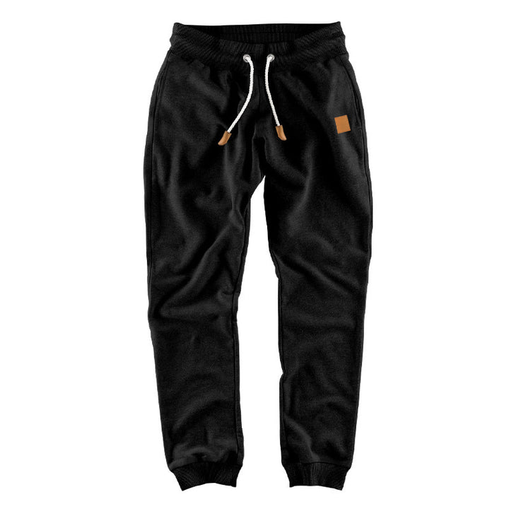 Premium athletic jogger pants for men with elastic waist and functional pockets Lune London