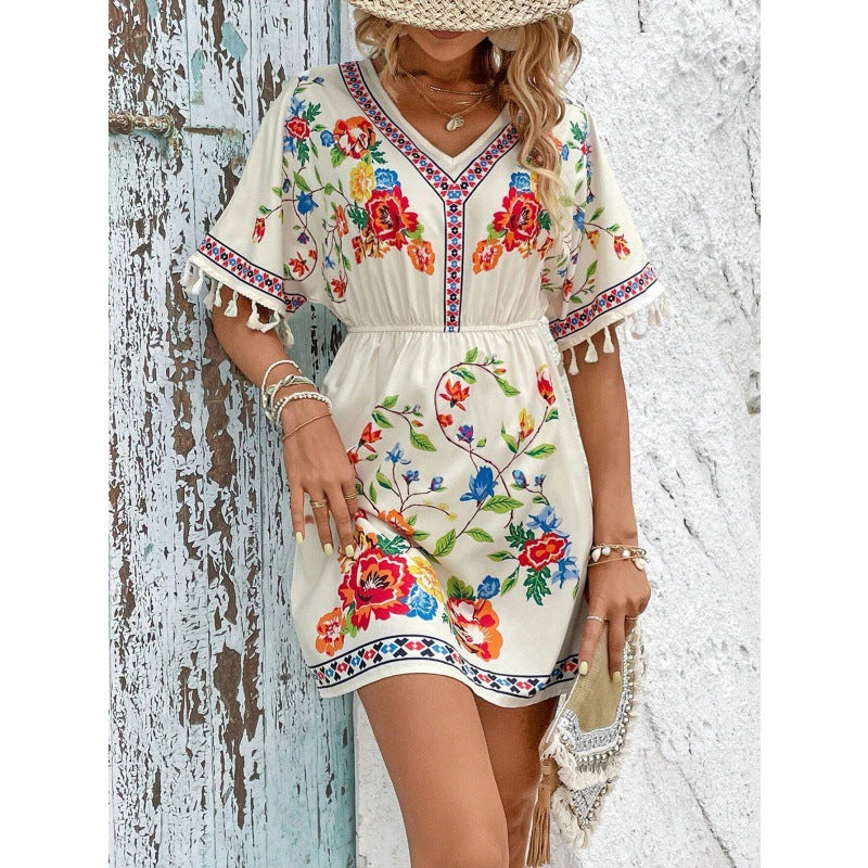 Casual women's dress with a floral design and fringe sleeves Lune London