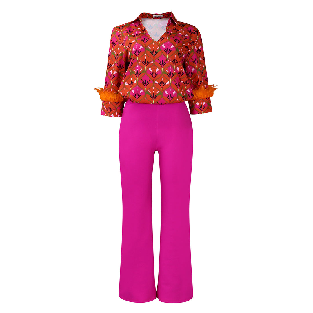 Expressive outfit for women with printed blouse and wide pants Lune London