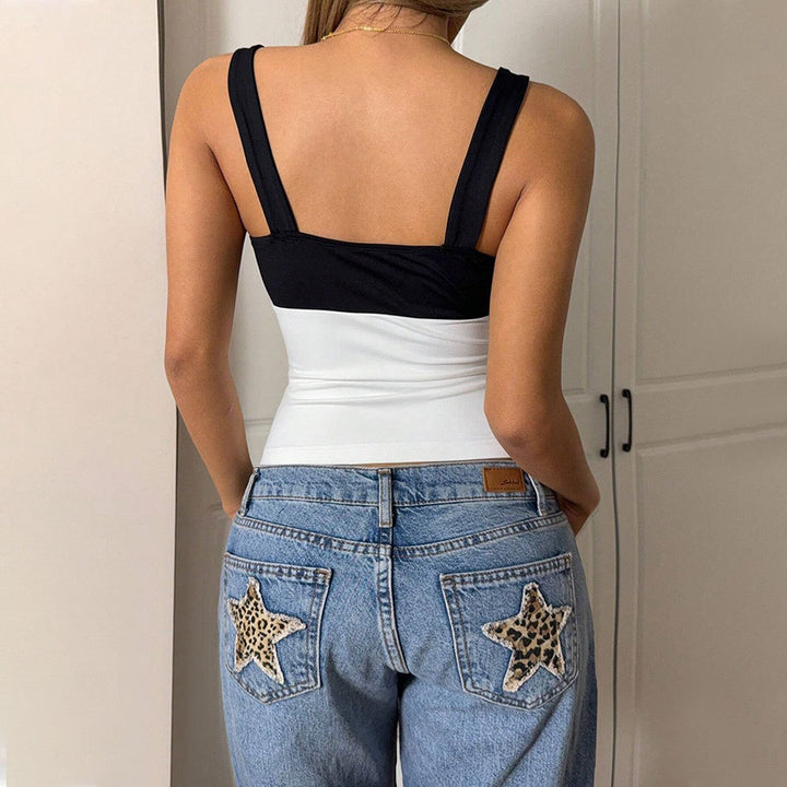 Elegant short top for women with asymmetrical design and contrasting colors Chic & Stil