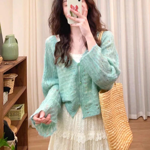 Lightweight knit cardigan for women with a fine openwork knit structure and a loose fit Amarae