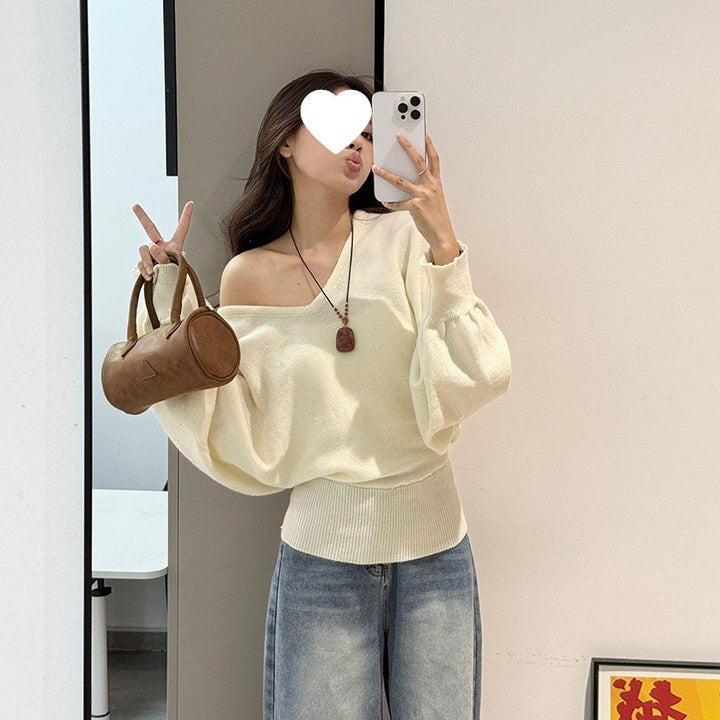 Pull féminin ample avec ceinture ajustable et décolleté en V Chic & Stil