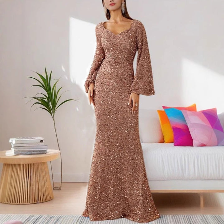 Ladies Glamorous Glitter Evening Dress with Swinging Skirt and Voluminous Sleeves Lune London