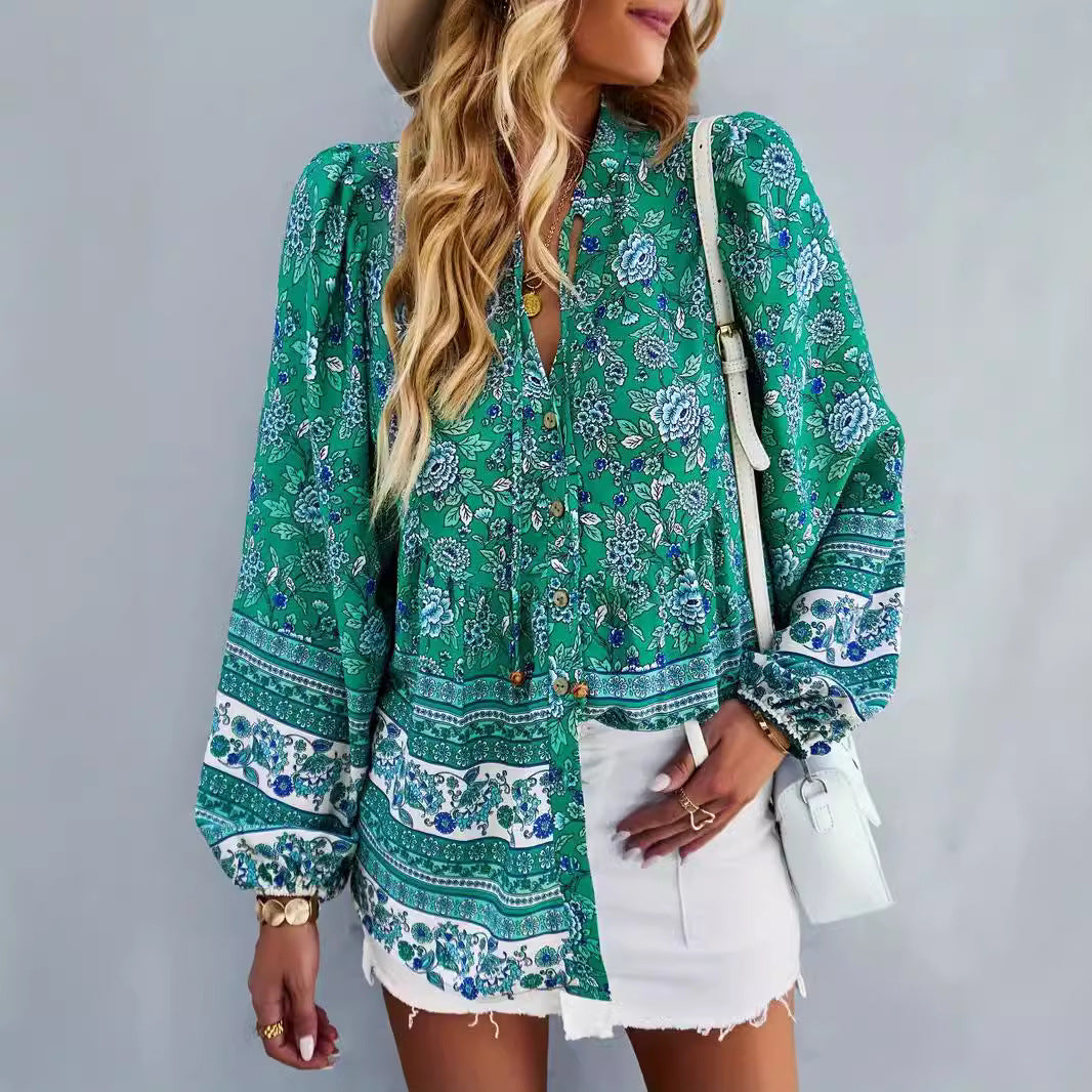 Woman blouse with colorful floral pattern and puff sleeves Lune London