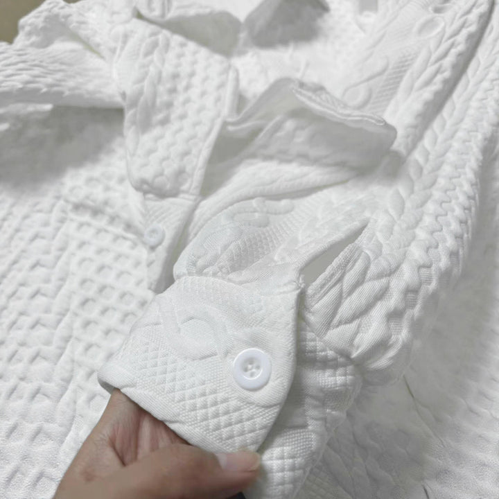 Oversized knitted blouse for women with a modern braid pattern Lune London