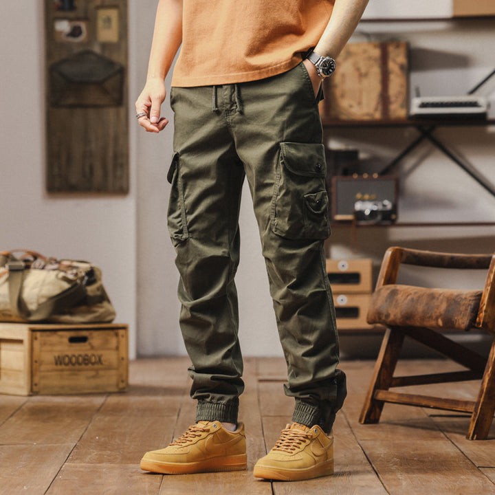 Multi-functional cargo pants for men with elastic waistband and practical pockets Lune London