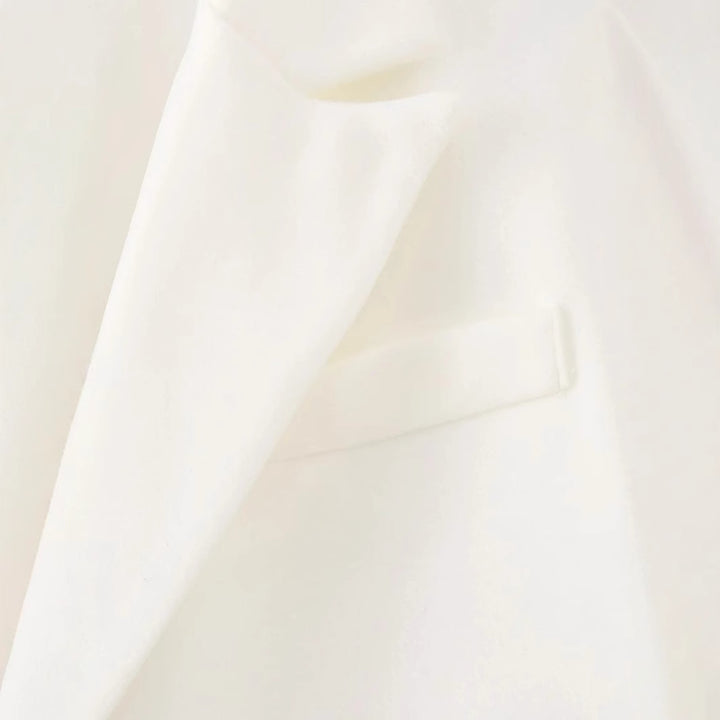 Elegant long coat for women with frayed details Amarae