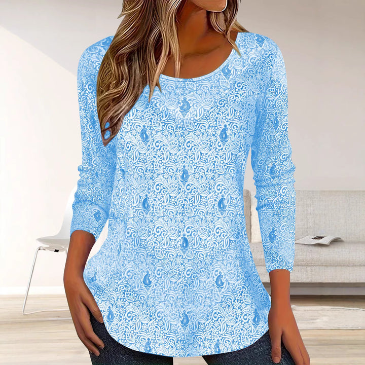 Simple long sleeve women's blouse with floral design and round neckline Lune London