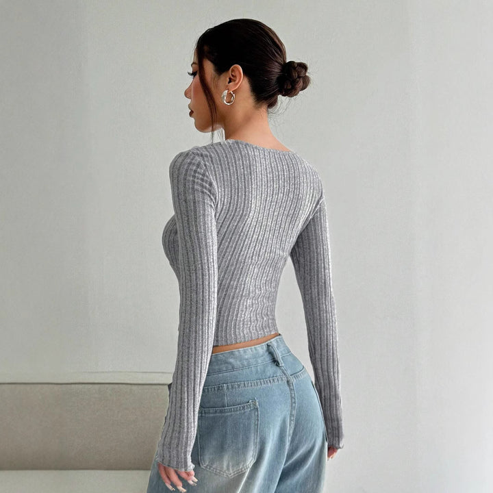 Top court à manches longues pour femme avec décolleté en V plongeant et texture côtelée Chic & Stil