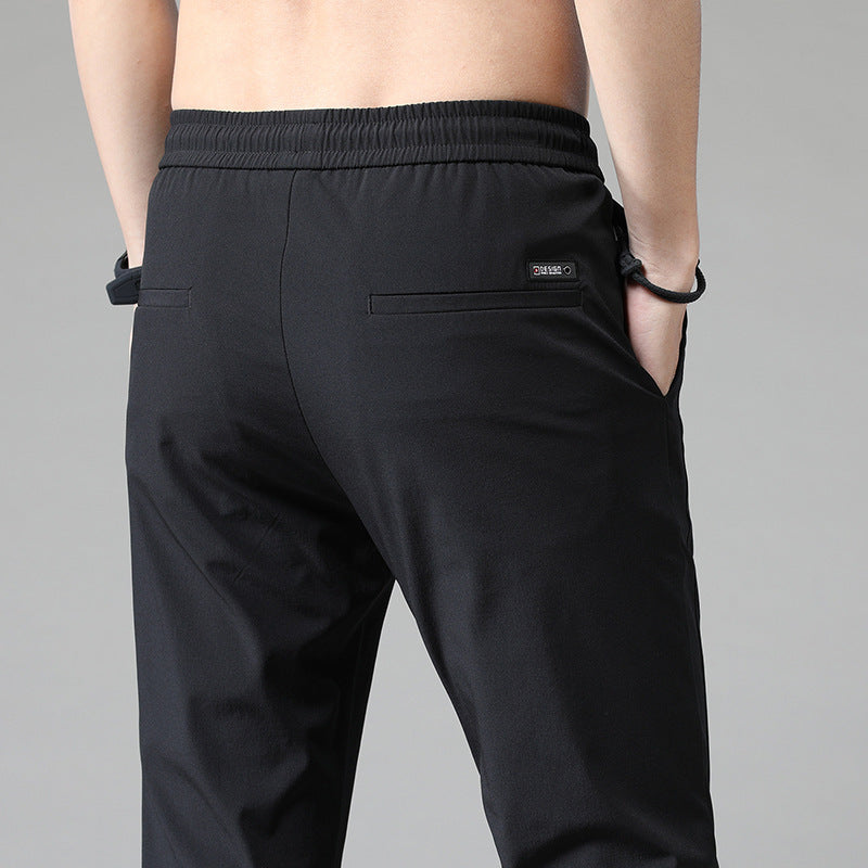 Men's sports pants with adjustable drawstring and zippered pockets on the sides Lune London