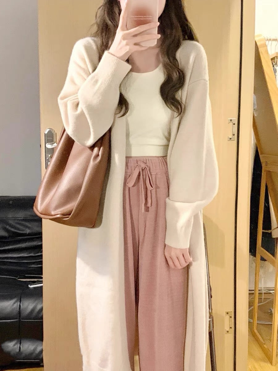 Manteau long en tricot pour femmes en matériau de haute qualité avec poches pratiques Chic & Stil