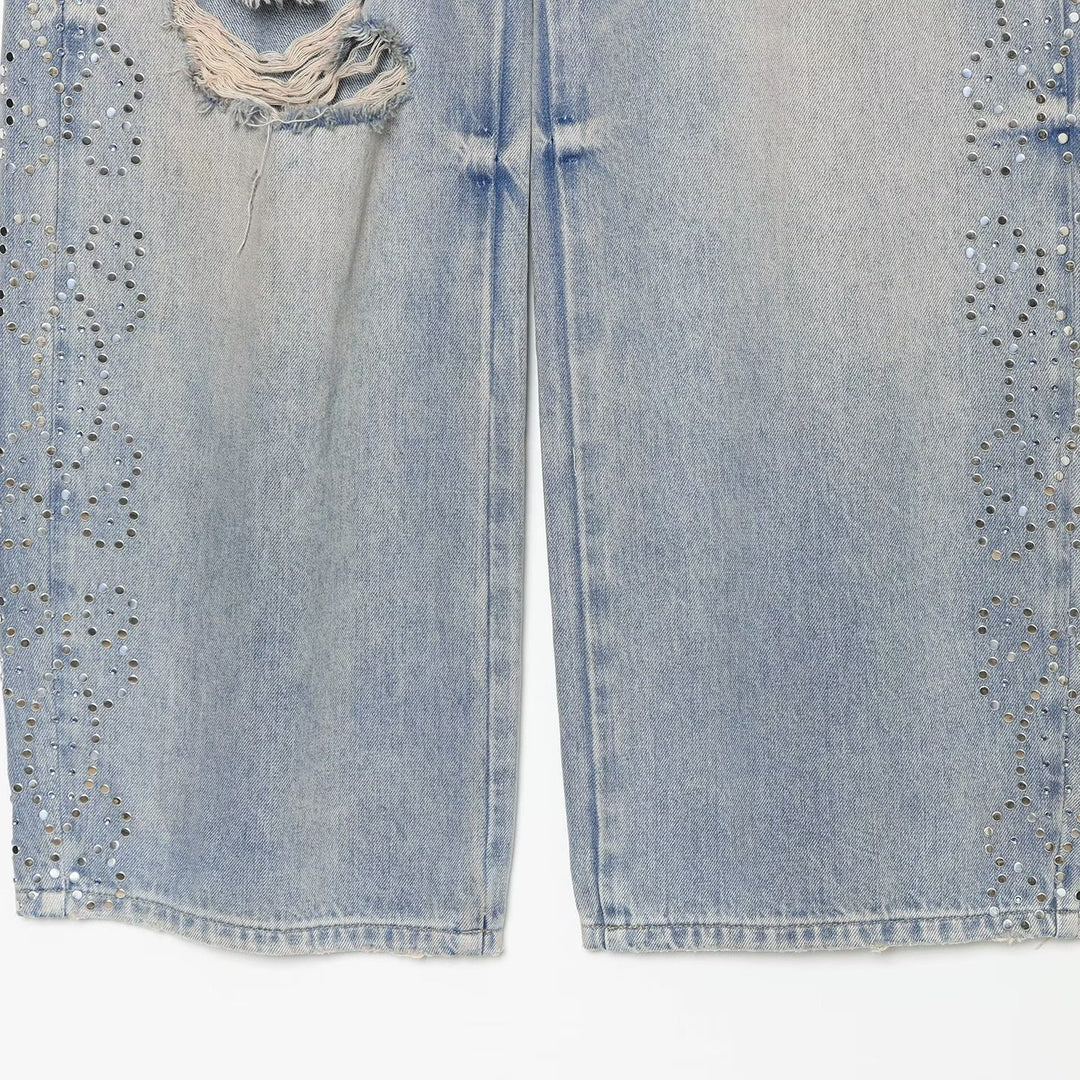 Women's jeans with a high waist, wide leg, rhinestone trim, and destroyed details Amarae