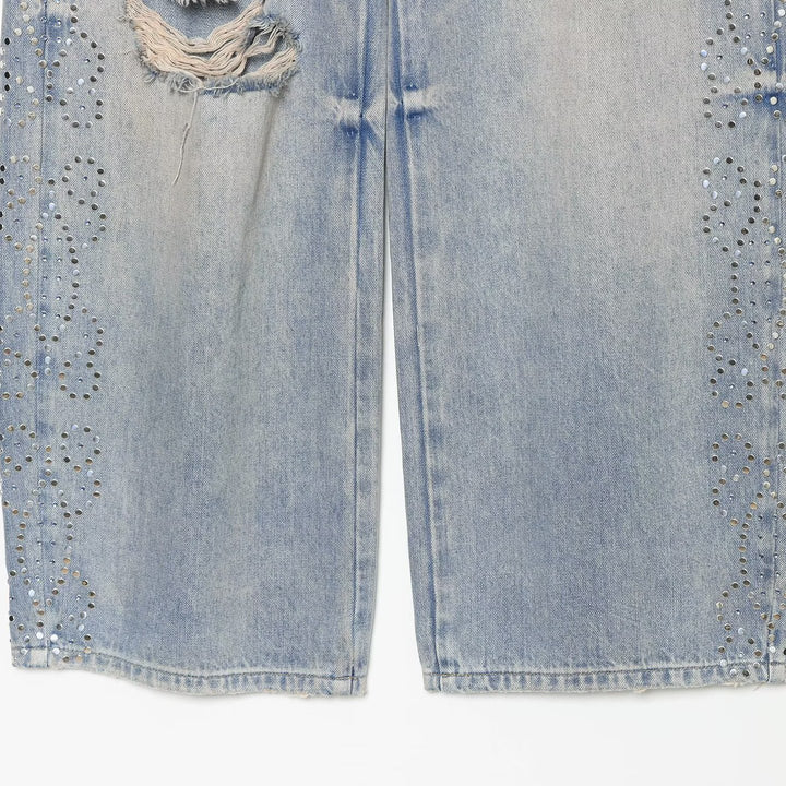 Women's jeans with a high waist, wide leg, rhinestone trim, and destroyed details Amarae