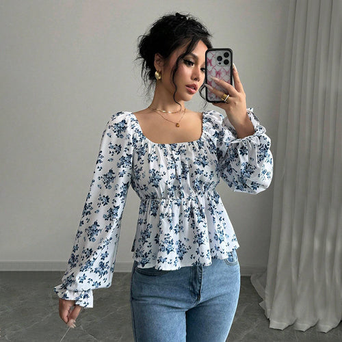 Blouse femme avec design floral et manches volumineuses Chic & Stil
