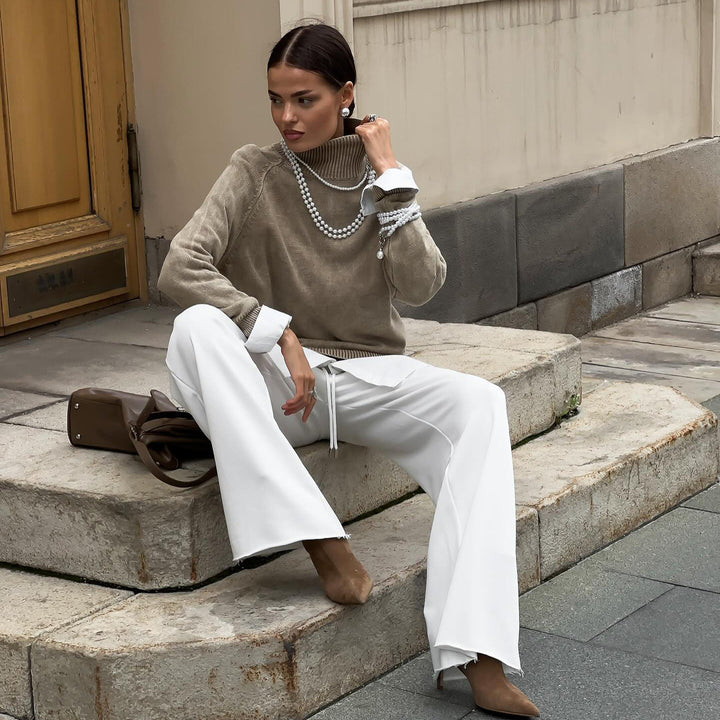 Ladies comfortable knitted sweater with high collar and elegant sleeve cuffs Lune London
