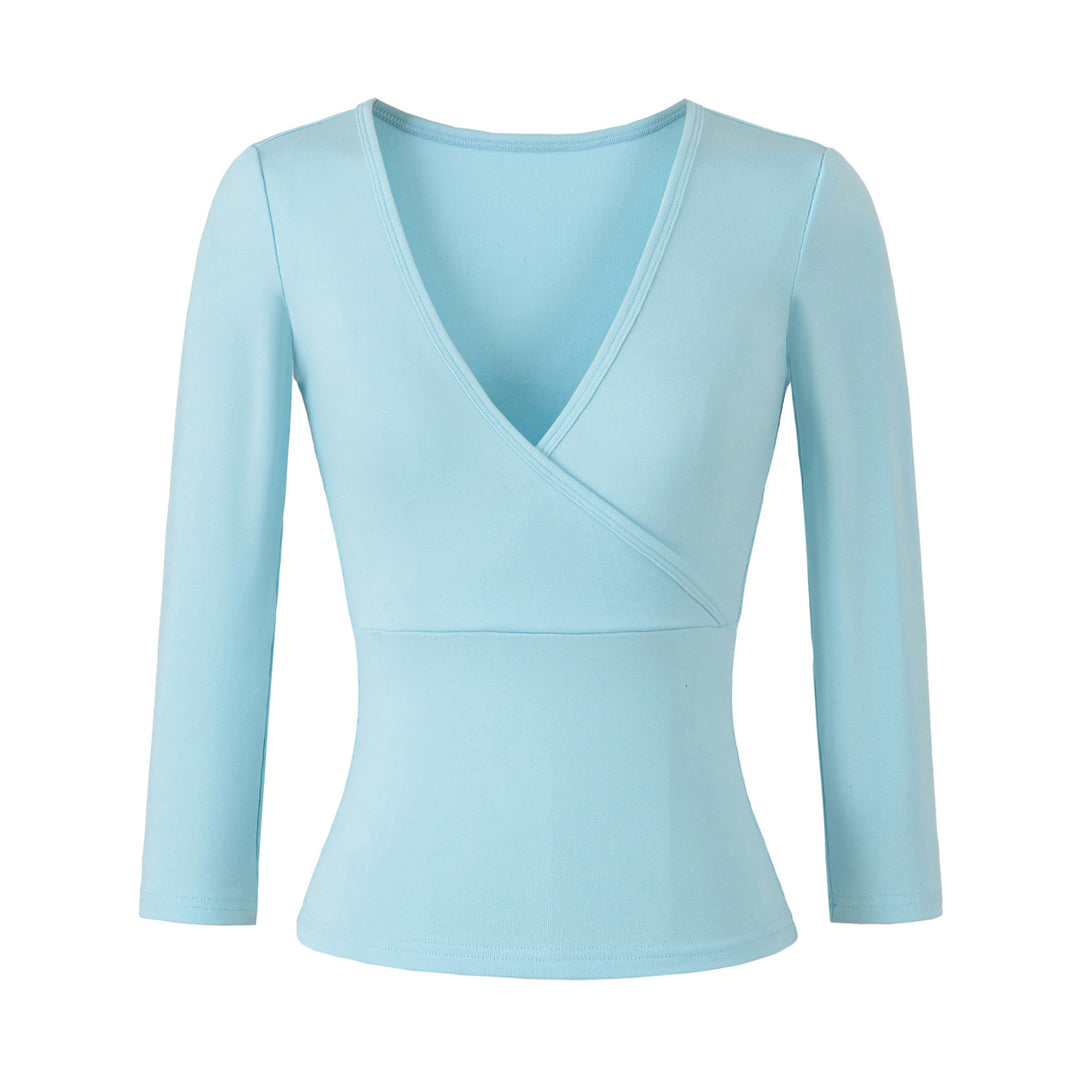 Women's figure-hugging wrap top made of stretch jersey with deep V-neck and tailored silhouette.